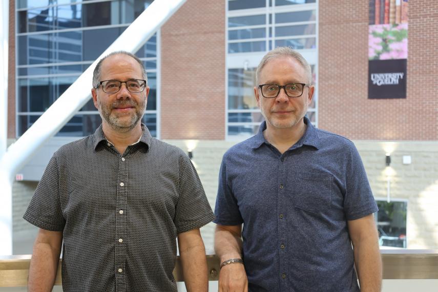 Dr. Vladimir Ladizhansky and Dr. Leonid Brown standing beside each other.