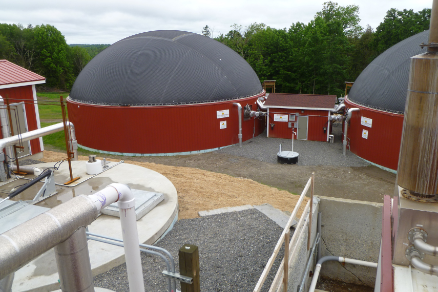 Large red silos with seeds surrounding