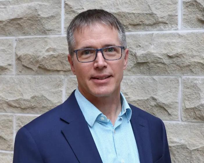 Headshot of Dr. John Dutcher