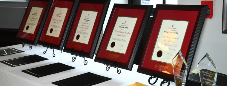 Award plaques on a table.