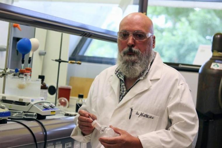 Dr. Mario Monteiro in his lab at the Unviersity of Guelph wearing PPE