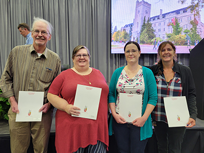 Image of exemplary award staff recipients and University of Guelph leadership