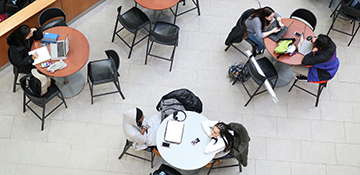 Top-down shot of students studying in Summerlee Science Complex