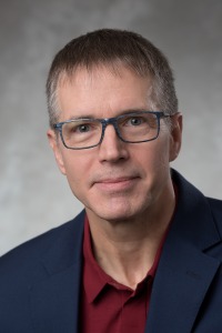 Headshot of Dr. John Dutcher