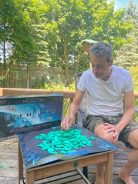 Dr. Marcus Garvie playing Eternity, the hardest puzzle ever created.