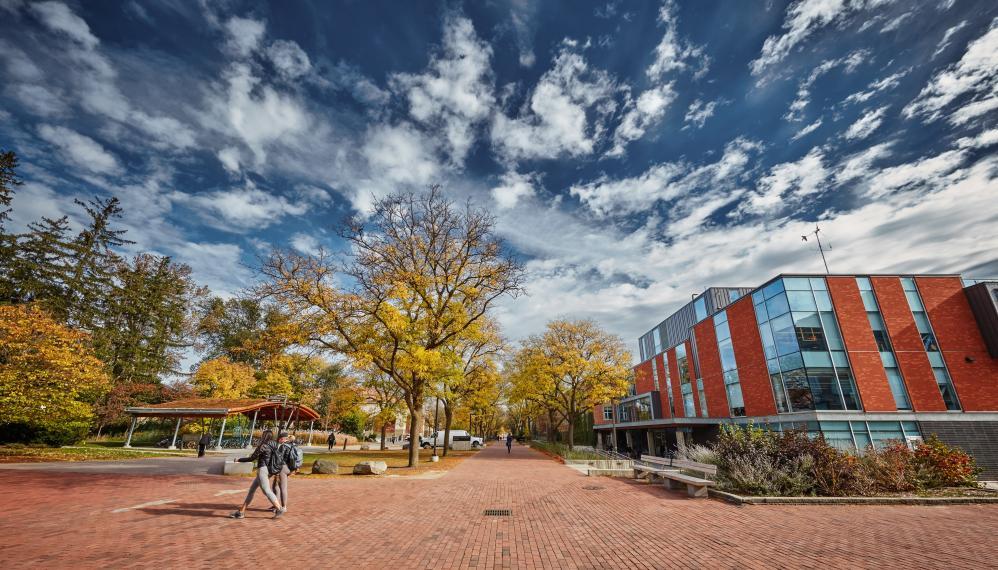 Image of students walking past Albert A. Thornbrough building.