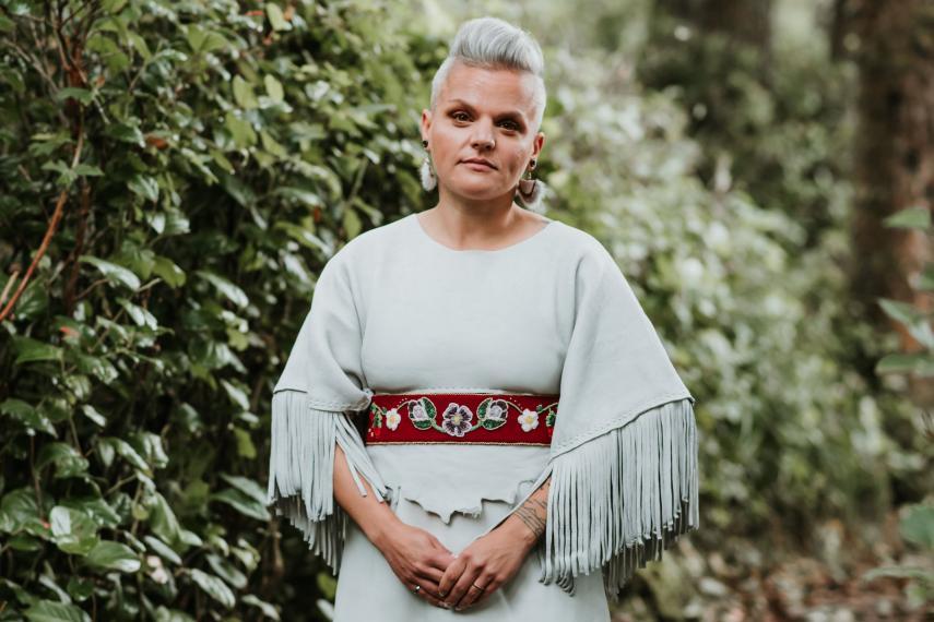 Image of Colleen O'Toole with greenery in background