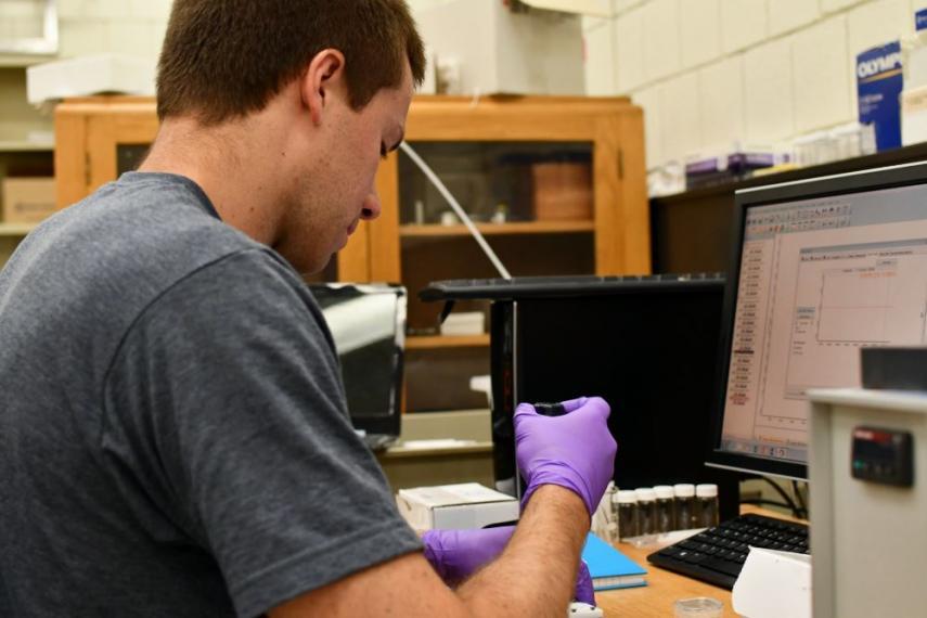 Dr. Mike Grossutti mounting a sample