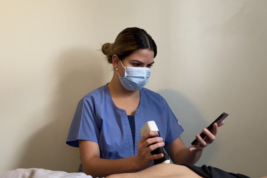 Miriam Naim Ibrahim taking an ultrasound image of a participant’s liver.