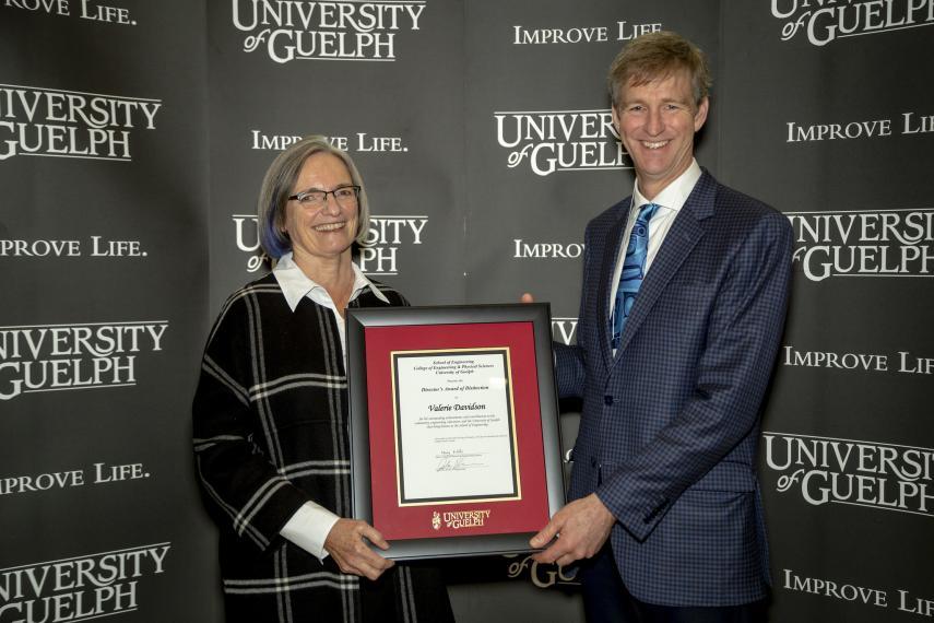 John Runciman presenting Professor Emerita Valerie Davidson with 2019 Director's Award of Distinction