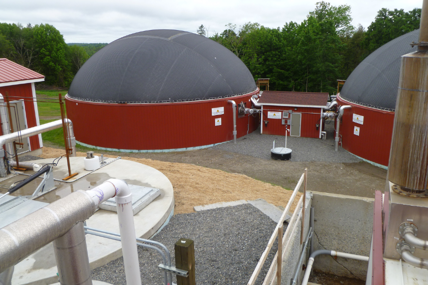 Large red silos with seeds surrounding 