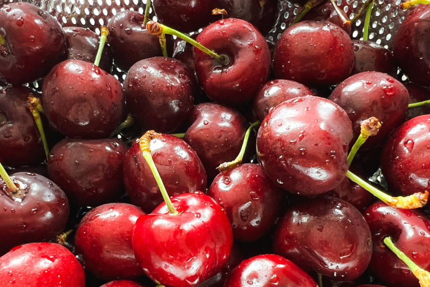 Washed cherries in a colander