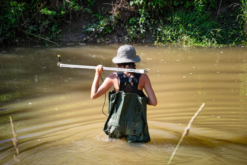 Collecting data in creek.