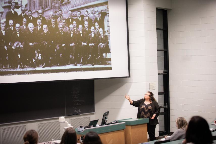 Second-place winner Victoria Arbour with her slide during her presentation: Physics is for everyone!