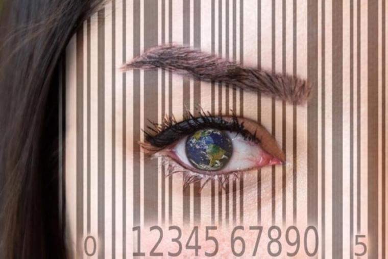 Photograph of a woman's eye with an overlay image of a supermarket barcode.