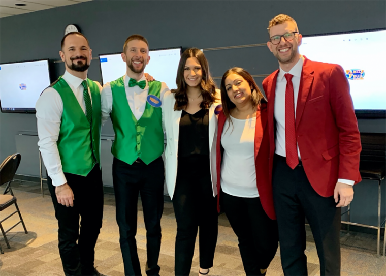 Melanie and her family in the Family Feud studio