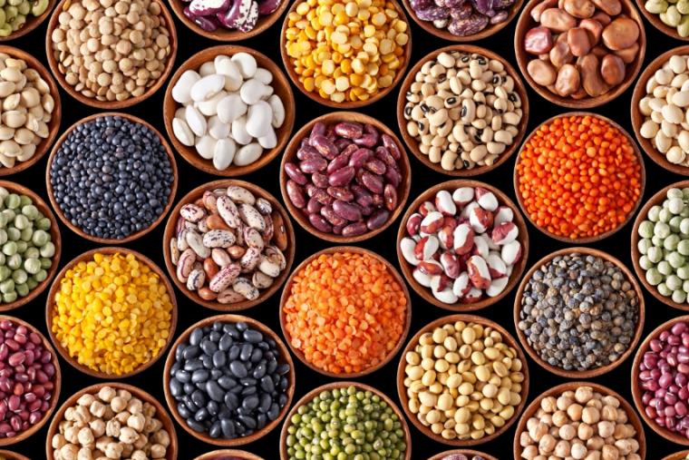 Photo of different types of beans and pulses in bowls