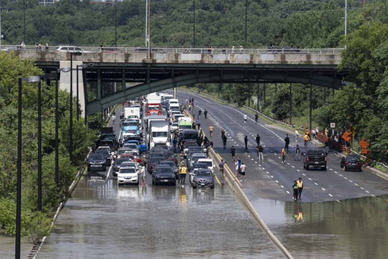 Cars in flooded street in Toronto. 