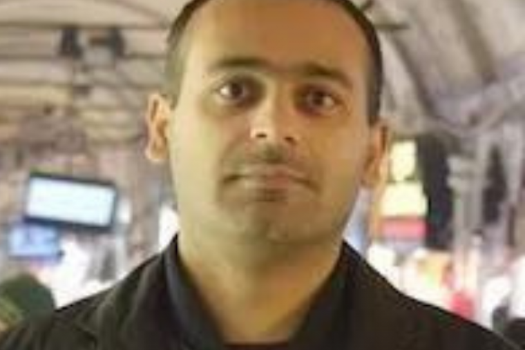 Headshot of Professor Hassan Khan