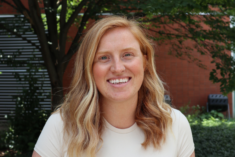 Headshot of Kristina Kupferschmidt outdoors.