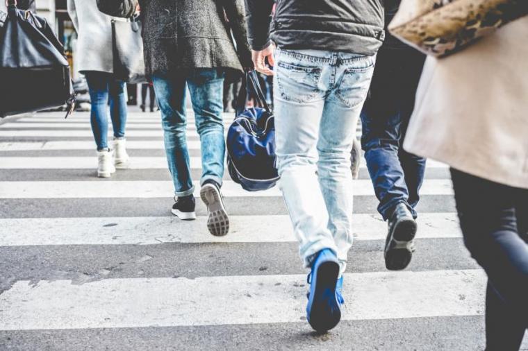 People walking on street in close proximity