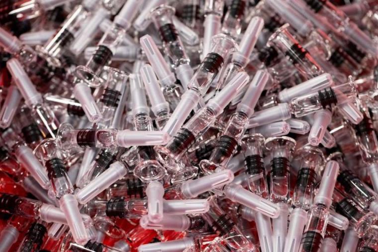 Image of vaccine needle pile