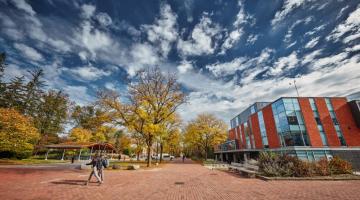 Image of students walking past Albert A. Thornbrough building.