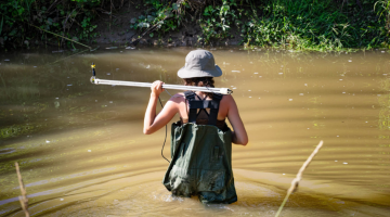 Collecting data in creek.