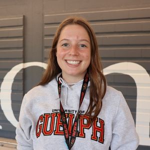 Rachel Tait smiling in a University of Guelph sweater