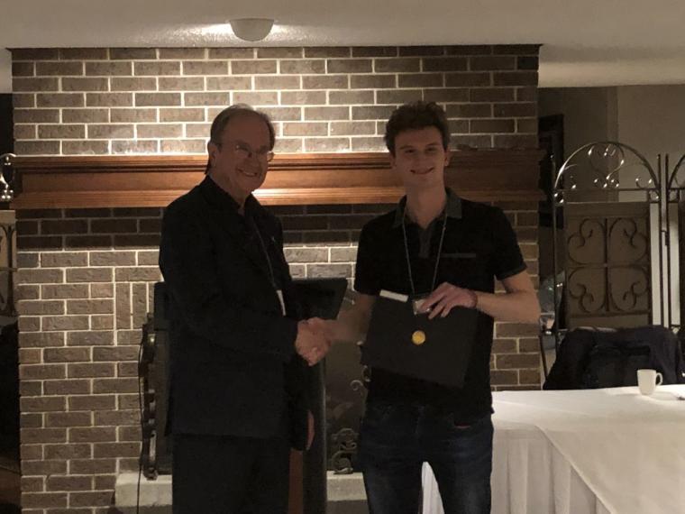 Professor Peter Tremaine presents the Canadian Society for Chemistry Silver Medal to Jeffrey Versluis