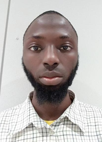 Headshot of Mukaila Ibrahim.