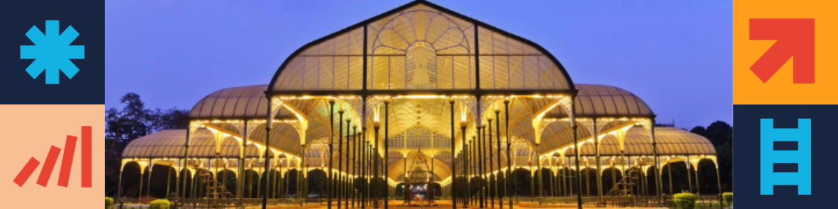 A lit up green house in India