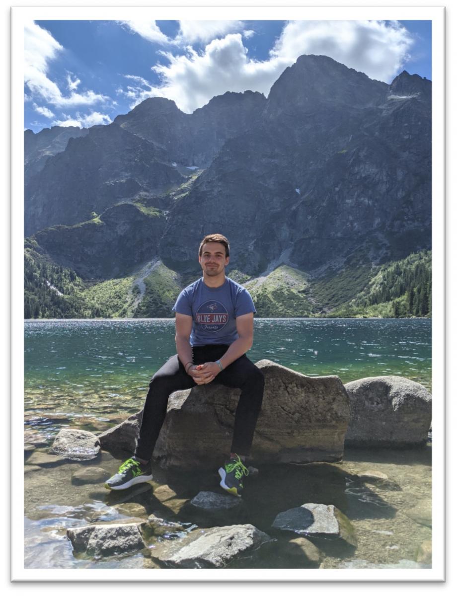 Jon in a Blue Jays t-shirt in the mountains