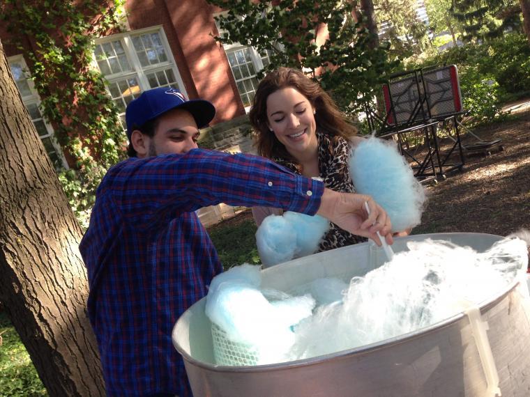 Serving up cotton candy at the Annual BBQ