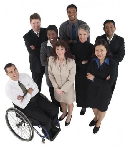 A photograph of diverse people, men and women, in business attire