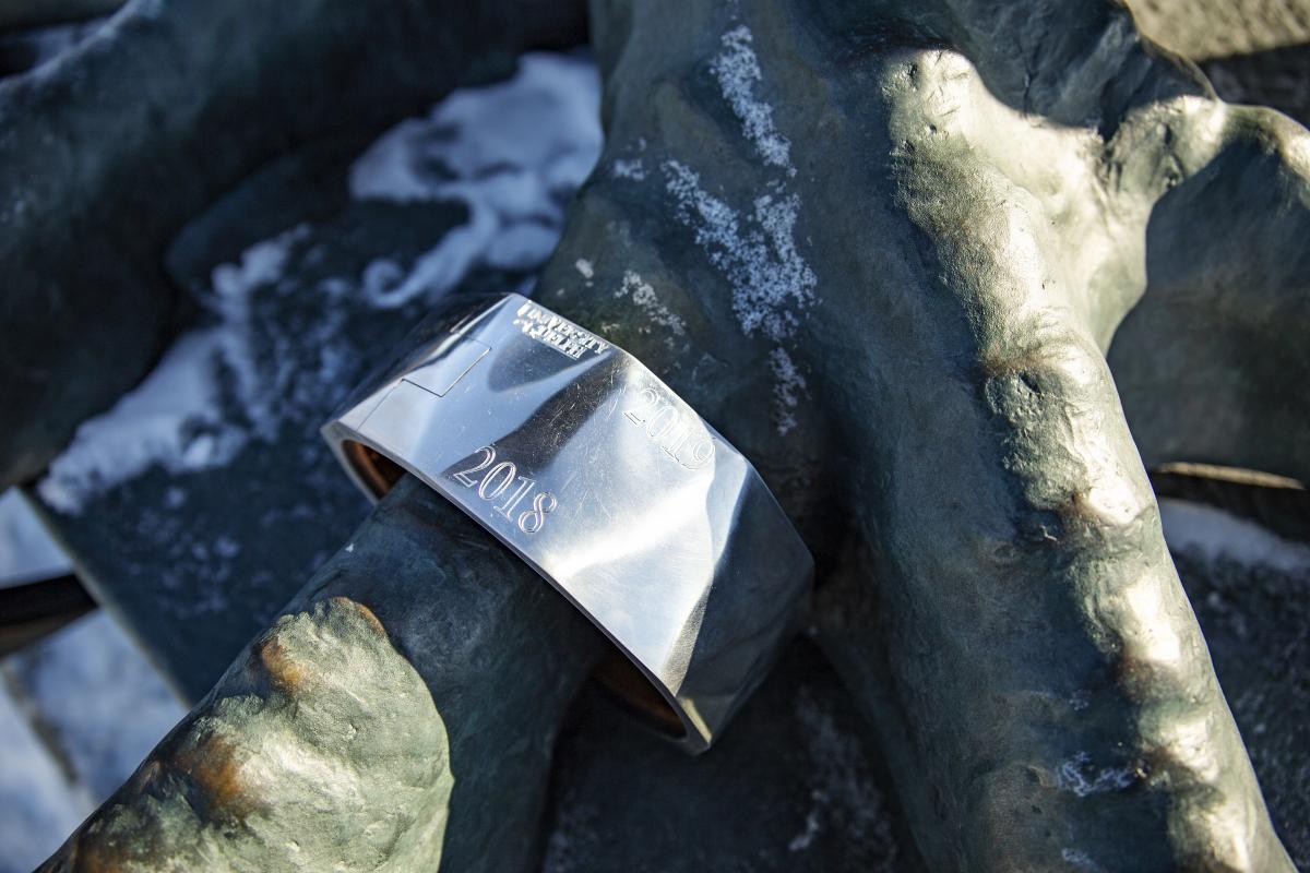 The newly designed ring, showing the engraved UofG logo, 2018 and 2019