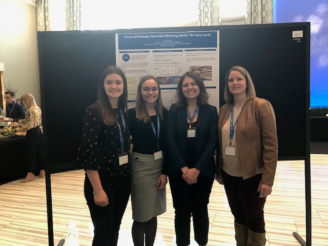 3 winners of poster competition (all from FARE:  Laura Stortz;  Amanda Norris;  Elsie Richmond) with current CAES president Cara Beckles from AAFC