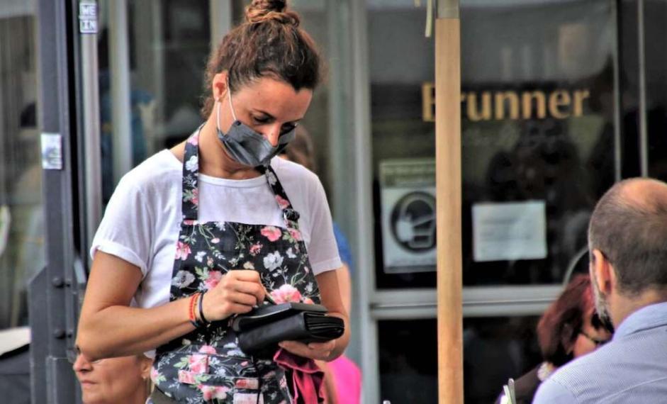 Server wearing a mask