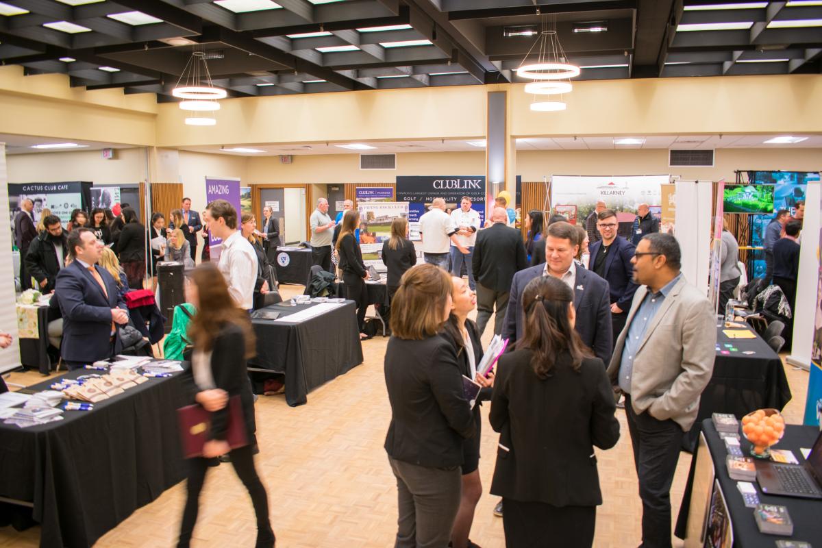 Photo of employers and students at the Job Expo