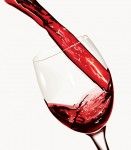 Pouring red wine into glass