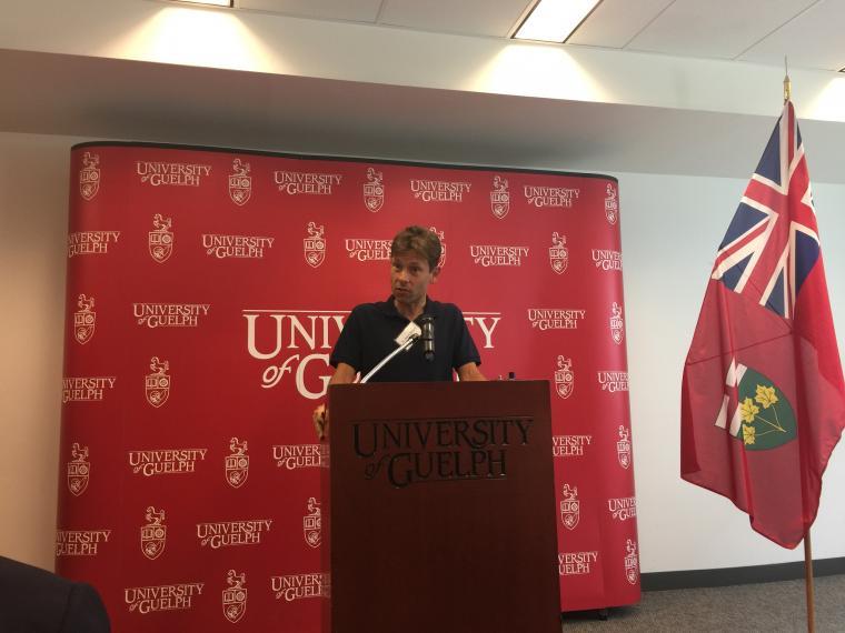 A photograph of David Wright making a speech at the funding announcement