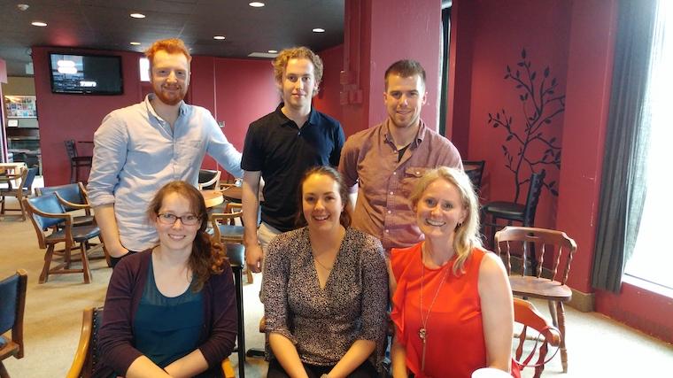 A photograph of the SOMBS organizing team consisting of (back row: Keaton Inkol, Jake Chaput, Lukas Linde. Front Row: Emily McIntosh, Becky Breau, Lori Vallis). Missing is David Shulman