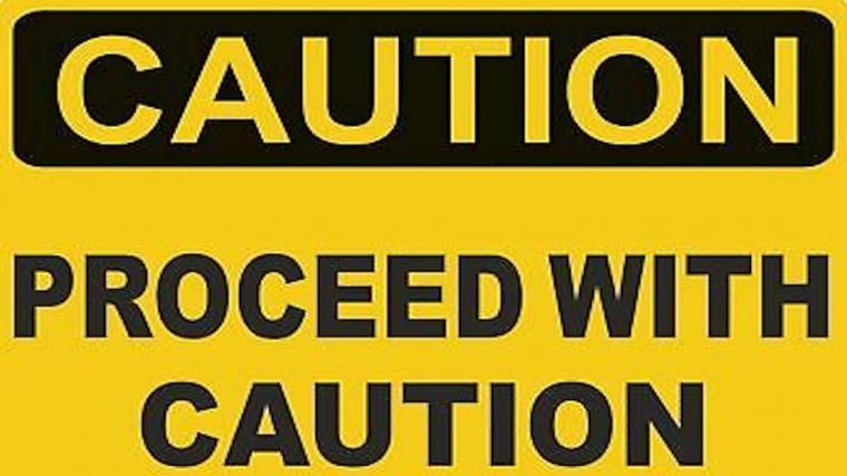 Warning Sign stating "Caution. Proceed with Caution"