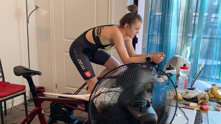 A photograph of Heather Petrick on her exercise bicycle.