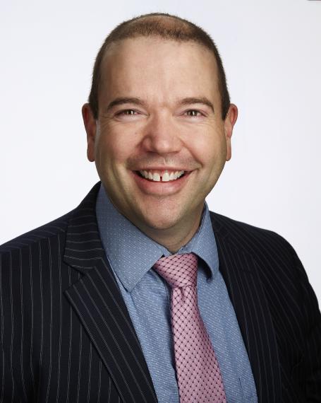 A photograph of Dr. Kyle Wilson.