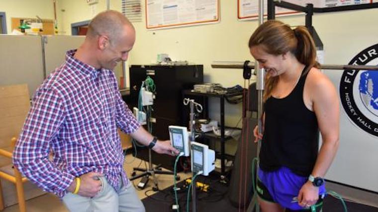 A photograph of Dr. Jamie Burr and Alex Coates