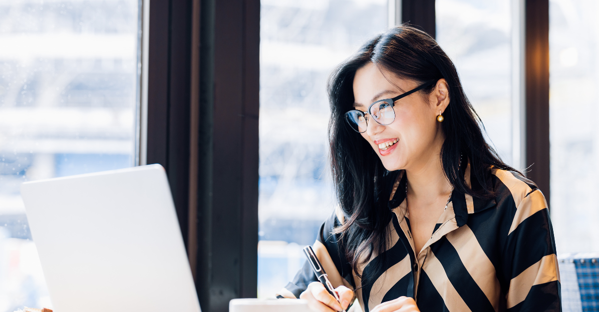 Woman accessing online coaching