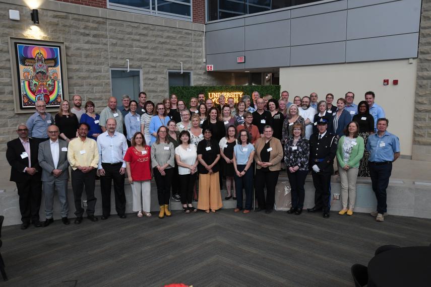 Photo of 25 year honourees standing