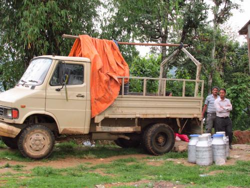  This is the beast of a truck that delivered us to the village over the most precarious roads I have ever traveled. Carved into the hills, these roads are rocky, rutted, land slide eroded and scary fun. Regular street motorbikes and scooters travel the same roads, putting us MX riders to shame. This truck delivers milk from the villages into Chapagoan, produce, 15+ passengers and in the middle of the night ... babies! The night before we left a woman from the village called for a ride into Chapagoan. She was in labour and needed to get to the hospital. The baby had other intentions and was delivered half way to the hospital. I know exactly why, the truck ride is bone-jarring. That baby was jostled out!