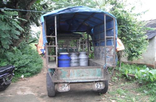 Truck with milk jugs